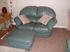 Leather Sofas A three seater and a two seater sofa in....